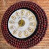 Handcrafted Rudraksh vintage wooden wall clock by VintCaneCraft
