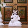 Pure white marble Bal Gopal idol with vintage hand-painted finish by VintCaneCraft